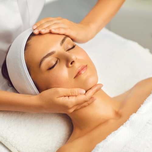 woman with face being massaged