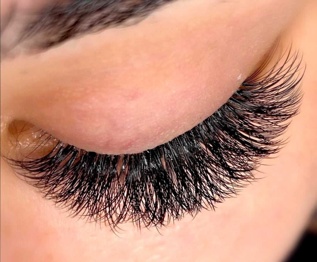 eye after eyelash extension and volume treatment looking down