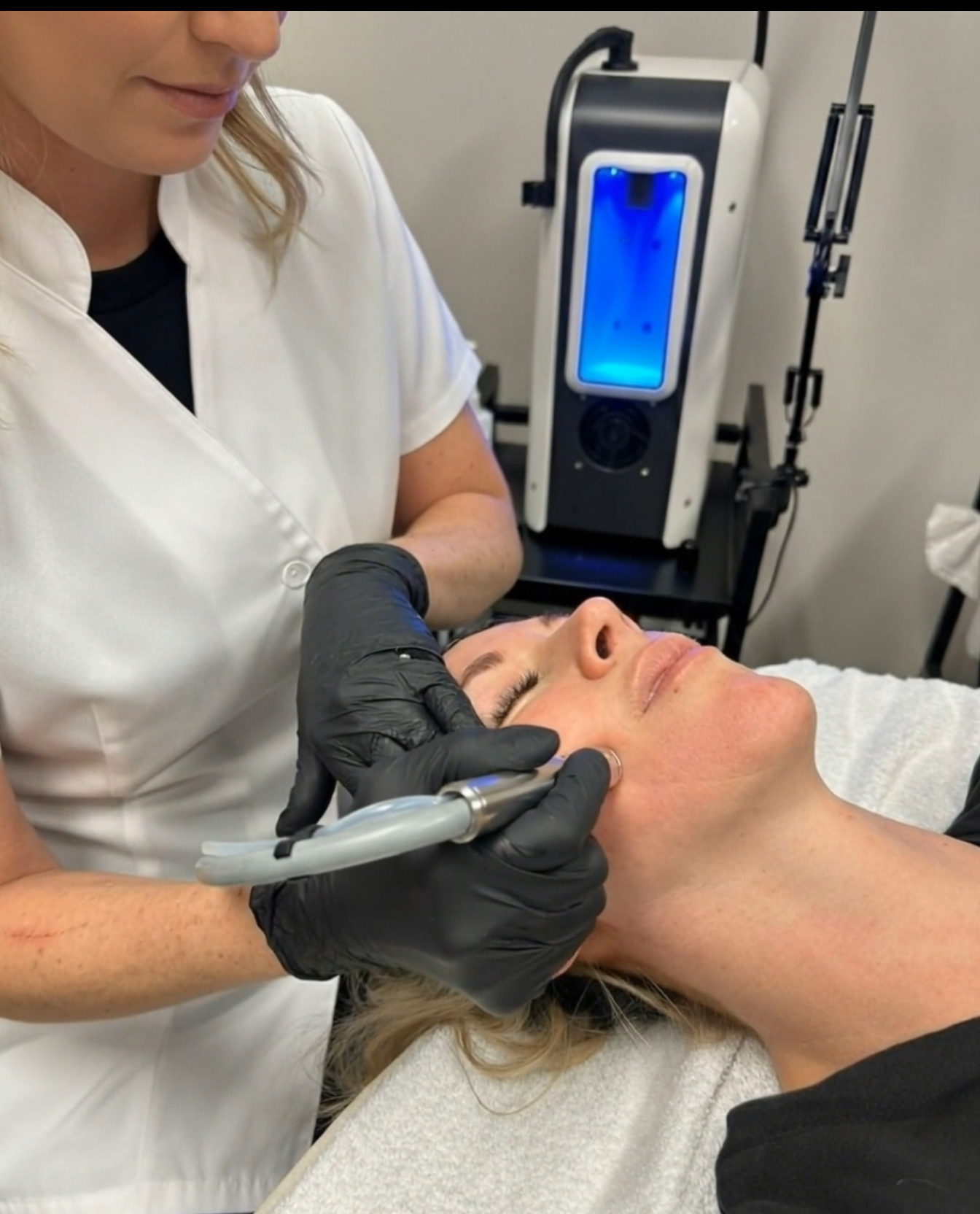 Close-up of HydraDermabrasion facial removing impurities and infusing hydrating serums at a Canmore day spa.