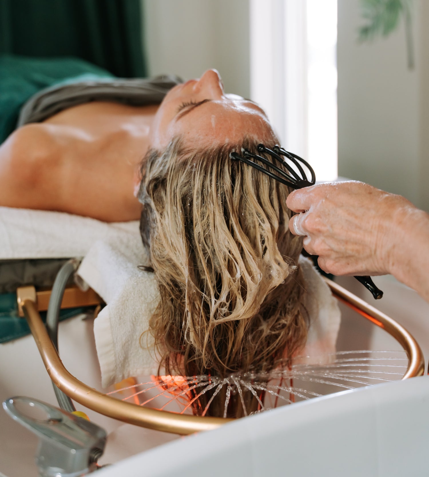 Japanese head spa treatment at Emerald Beauty in Canmore, Alberta, offering relaxing scalp and hair treatments for clients in Canmore and Banff